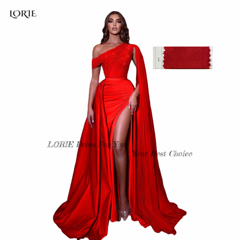 Unique red evening gown with a one-shoulder draped design and high