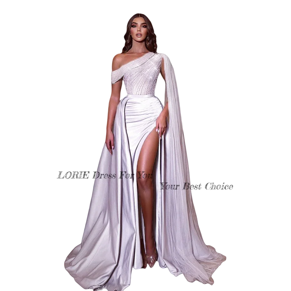 Unique White evening gown with a one-shoulder draped design and high