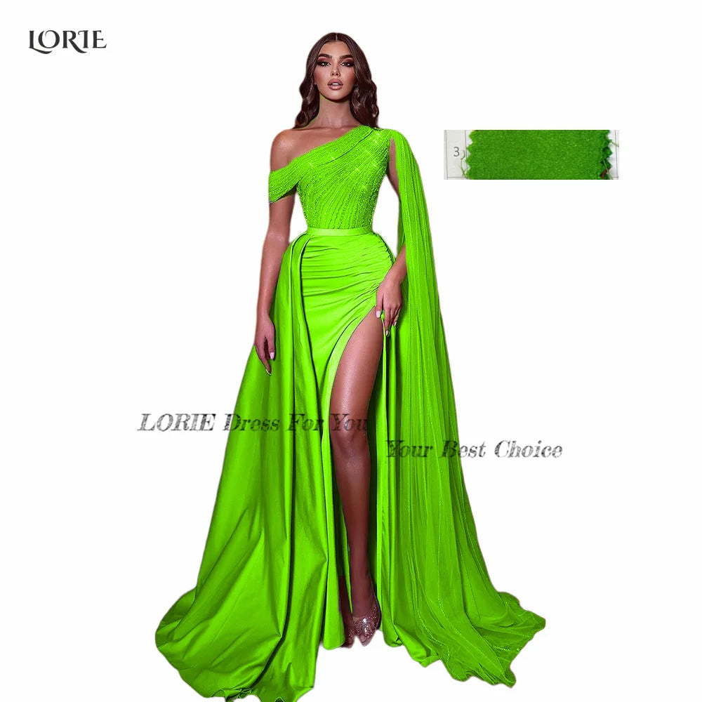 Unique Green evening gown with a one-shoulder draped design and high
