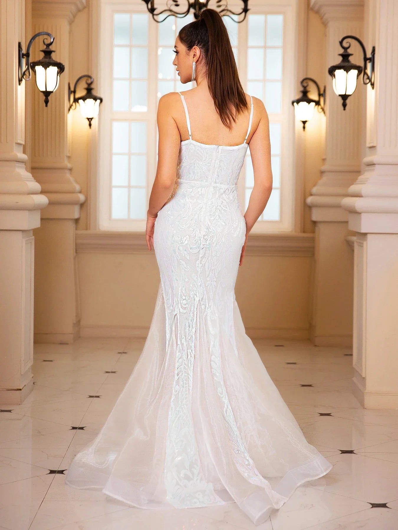 Elegant White Mermaid Evening Gown with Plunging Neckline and Sheer Train