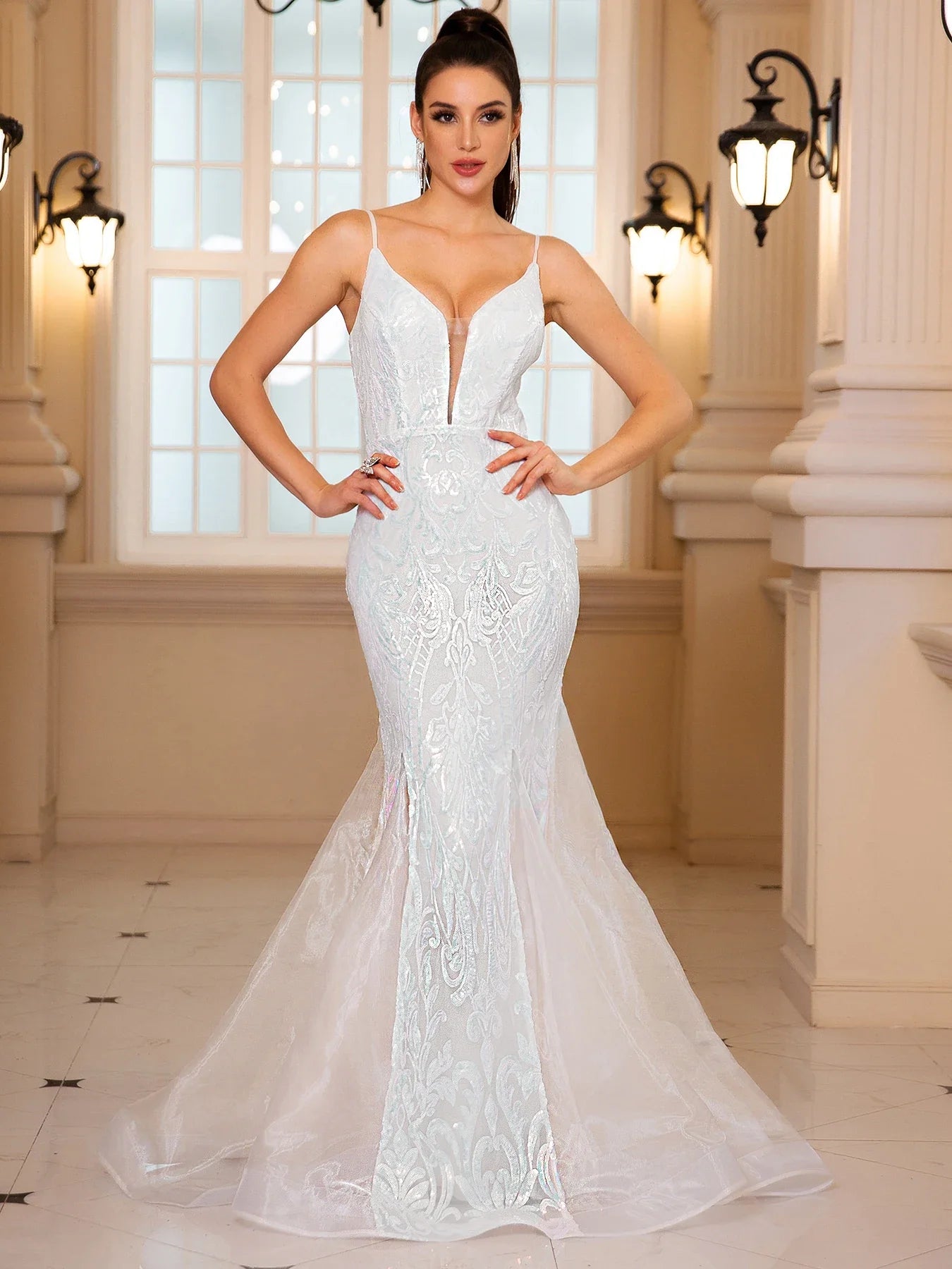 Elegant White Mermaid Evening Gown with Plunging Neckline and Sheer Train