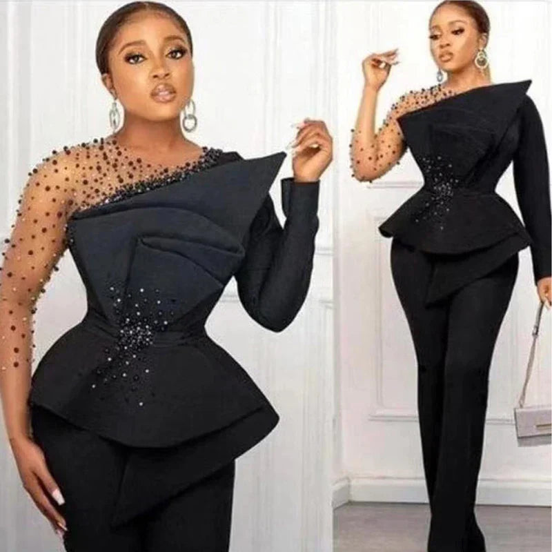 Black beaded peplum suit with intricate beadwork and asymmetrical one-sleeve design, perfect for formal events and galas.